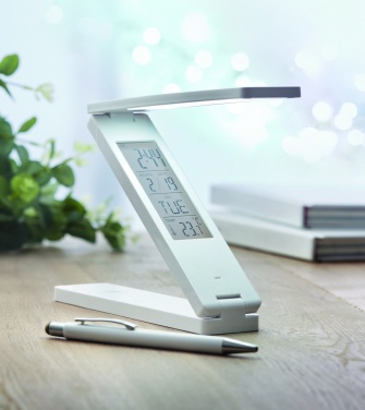 Logotrade Werbegeschenke das Foto: Faltbare Tischleuchte mit Uhr